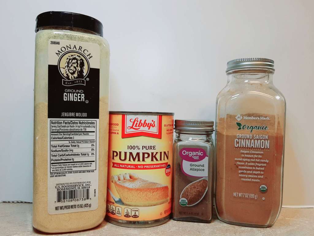 small assortment of taste of fall spices and canned pumpkin on a counter
