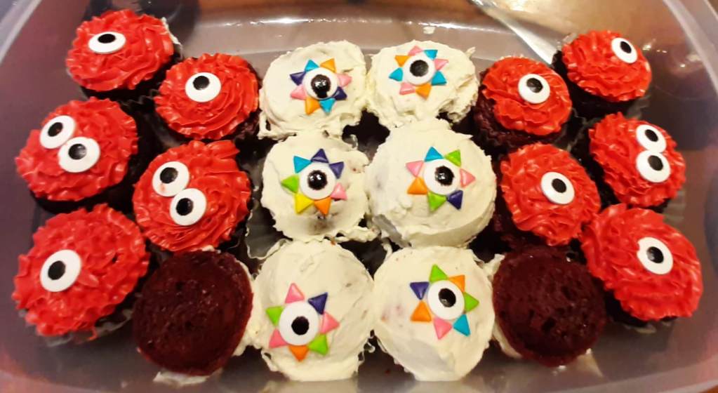 red and white frosted cupcakes