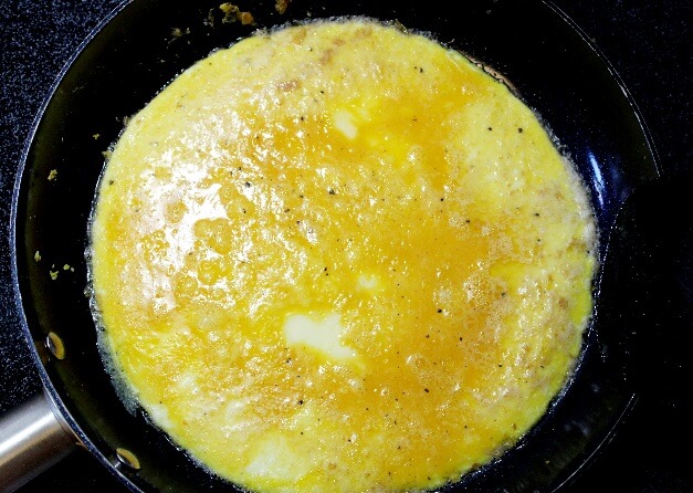 eggs cooking in a pan