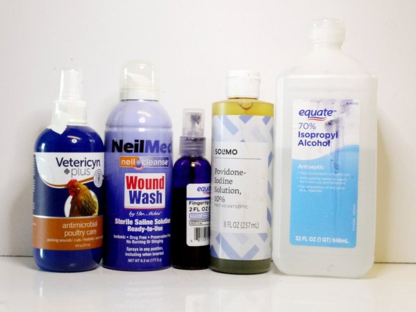 assortment of antiseptics and poultry first aid care