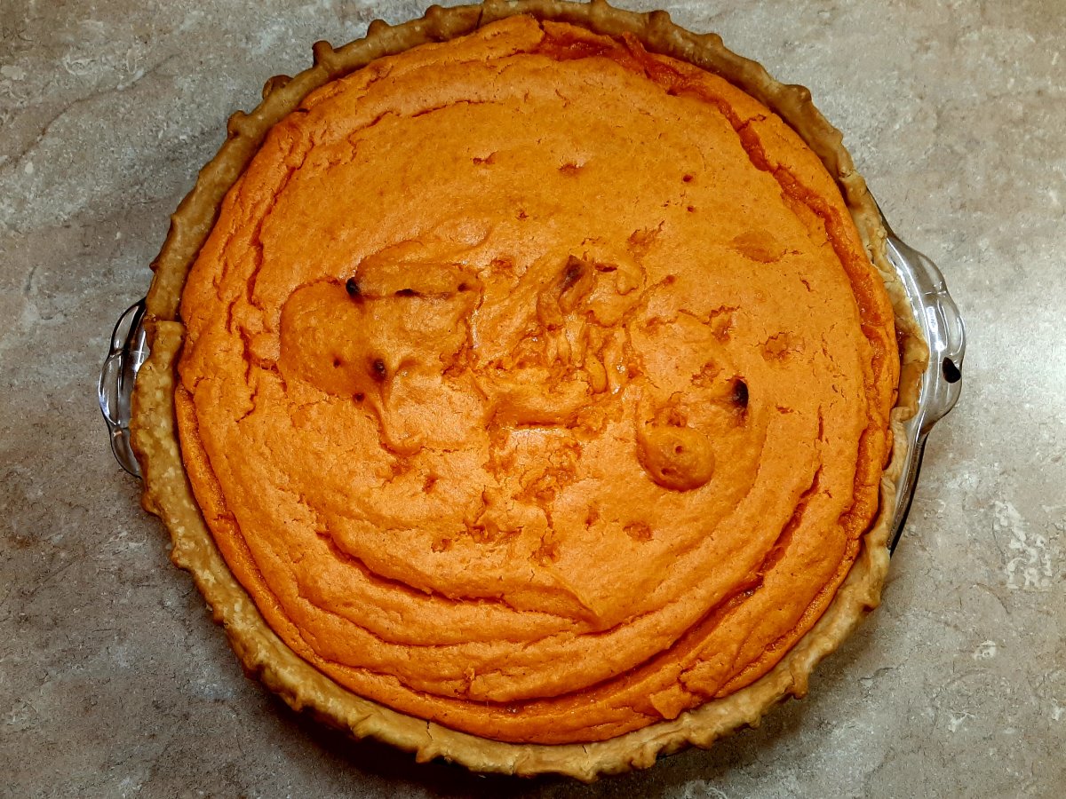 sweet potato pie in glass pie pan