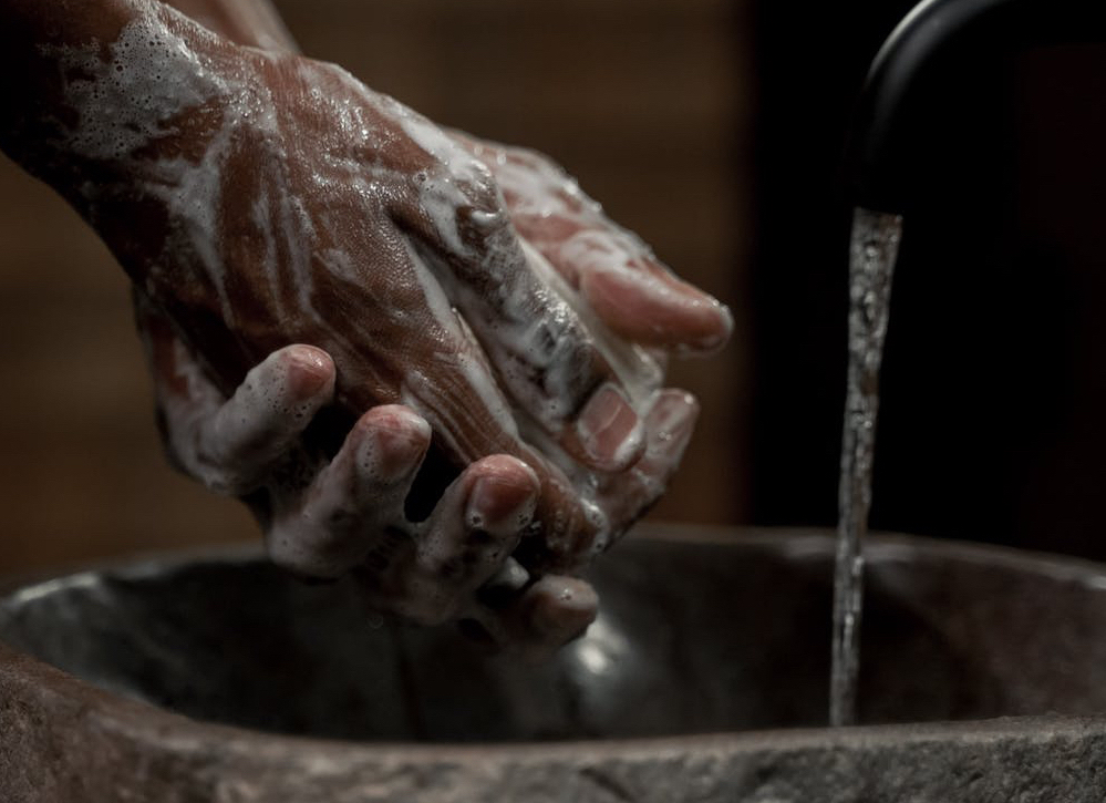 person washing hands